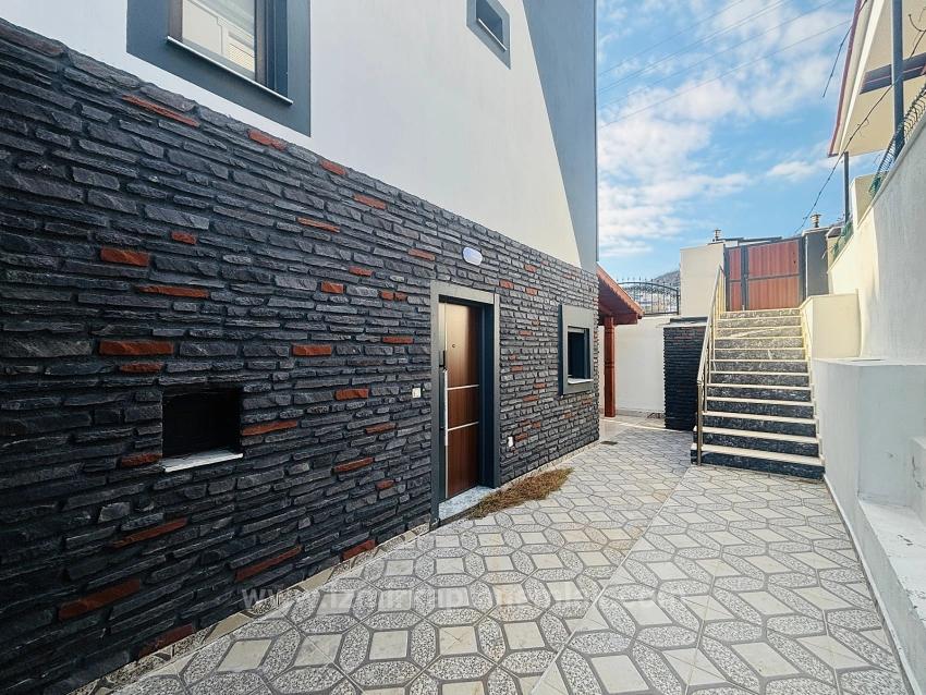 Villa Mit 4+1 Schlafzimmern Und Meerblick Sowie Eigentumswohnung In Seferihisar Doğanbey Zu Verkaufen