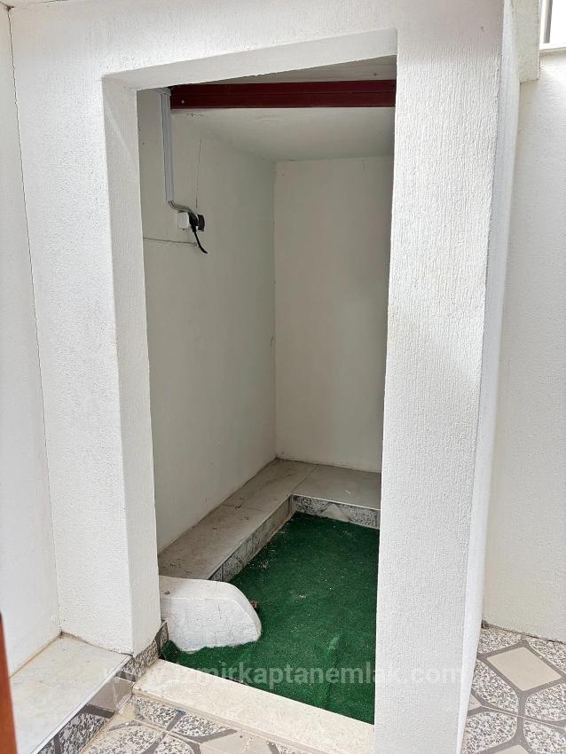 Villa Mit 4+1 Schlafzimmern Und Meerblick Sowie Eigentumswohnung In Seferihisar Doğanbey Zu Verkaufen