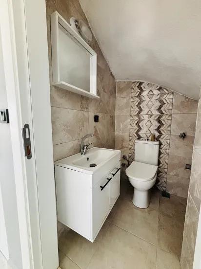 In İzmir Seferihisar Cumhuriyet Viertel mit gemeinsamem Eingang 3+1 zu verkaufen freistehende Villa