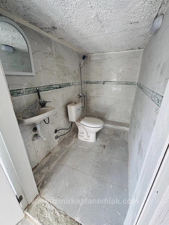 2+1 Apartment For Sale In Seferihisar Ürkmez With Separate Kitchen And Garden, No Expenses