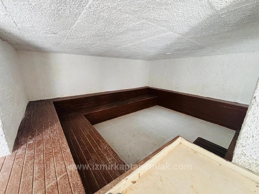 2+1 Apartment For Sale In Seferihisar Ürkmez With Separate Kitchen And Garden, No Expenses