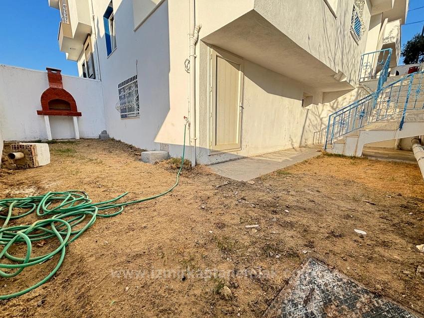 2+1 Apartment For Sale In Seferihisar Ürkmez With Separate Kitchen And Garden, No Expenses