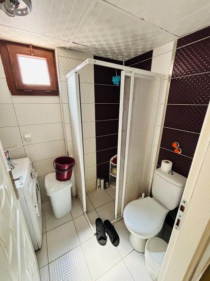 2+1 Ground Floor Apartment With Glass Balcony In A Central Location In Bengiler, Seferihisar, Izmir