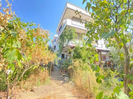 In İzmir Seferihisar Mersin Alanı Neighbourhood 400m to the sea 2+1 expense-free flat for sale