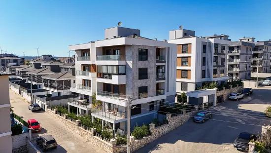 İzmir Seferihisar pool In the site Inside for sale 3+1 apartment.