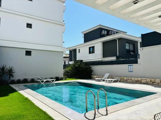 İzmir Seferihisar pool In the site Inside for sale 3+1 apartment.