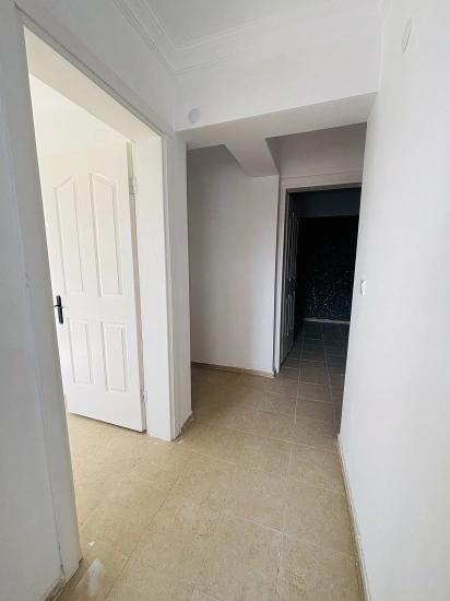 2+1 Apartment For Sale In Seferihisar Ürkmez With Separate Kitchen And Garden, No Expenses