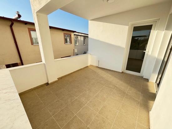 2+1 Apartment For Sale In Seferihisar Ürkmez With Separate Kitchen And Garden, No Expenses