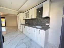 Brand New 4+1 Triplex For Sale In Menderes Özdere, 50 M From The Beach With A Large Garden