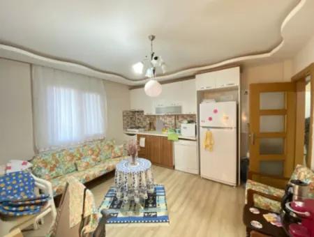2 1 Apartment For Sale In Ürkmez Center With Closed Garage And Garden