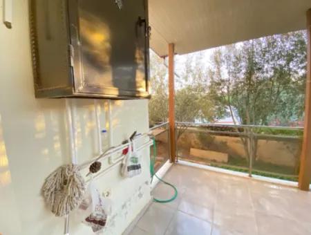 2 1 Apartment For Sale In Ürkmez Center With Closed Garage And Garden