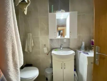 2 1 Apartment For Sale In Ürkmez Center With Closed Garage And Garden