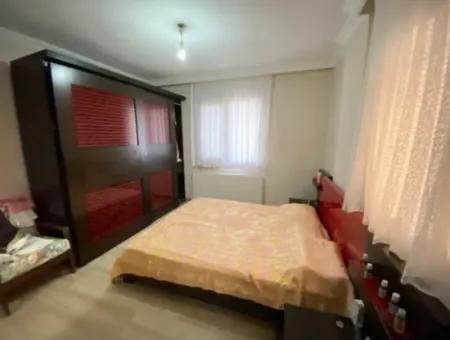 2 1 Apartment For Sale In Ürkmez Center With Closed Garage And Garden