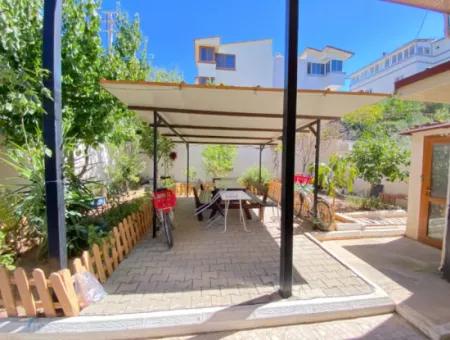 2 1 Apartment For Sale In Ürkmez Center With Closed Garage And Garden