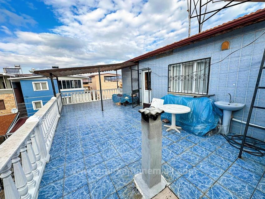 Продается Вилла С 4 Спальнями И 1 Ванной Комнатой В Центре Района Паямлы, Сеферихисар, Измир, В Нескольких Минутах Ходьбы От Моря.