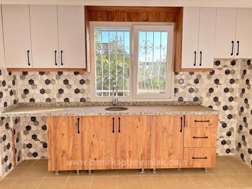 Продаётся Квартира 2+1 В Районе Сеферихисар-Уркмез С Отдельной Кухней И Садом. Без Расходов.