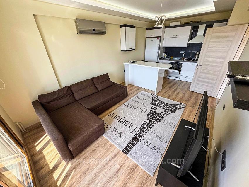 Продается Квартира (1+1) В Жилом Комплексе С Бассейном В Районе Бенгилер, Сеферихисар, Измир.