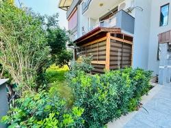 Квартира 2+1 На Первом Этаже Со Стеклянным Балконом В Центре Района Бенгилер, Сеферихисар, Измир.