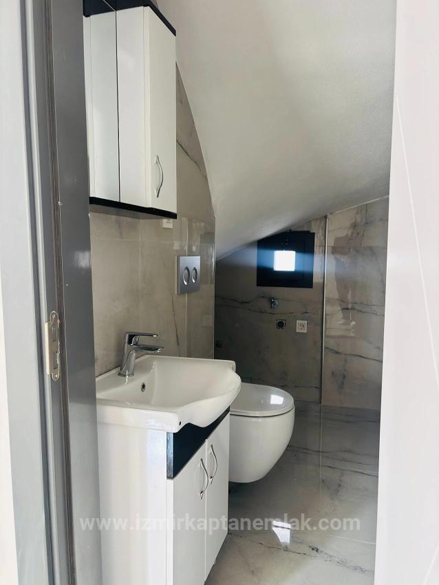 Seferihisar Doğanbey'de Deniz Manzaralı Kat Mülkiyetli 4+1 Satılık Villa