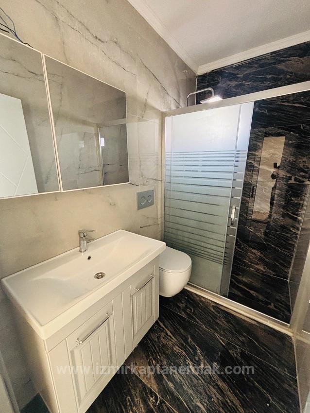 Seferihisar Doğanbey'de Deniz Manzaralı Kat Mülkiyetli 4+1 Satılık Villa