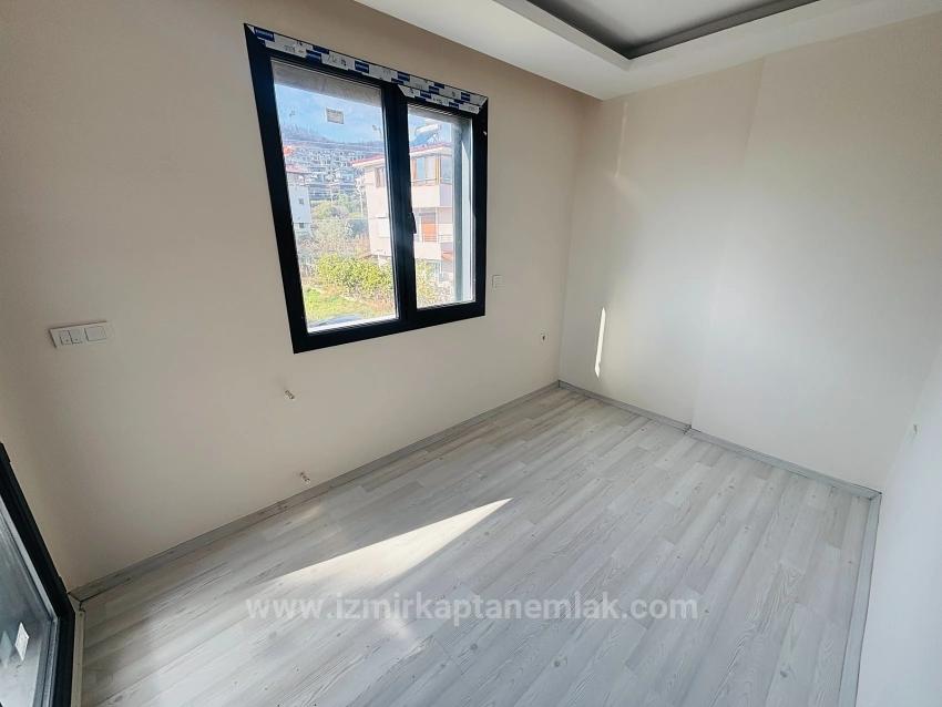 Seferihisar Doğanbey'de Deniz Manzaralı Kat Mülkiyetli 4+1 Satılık Villa