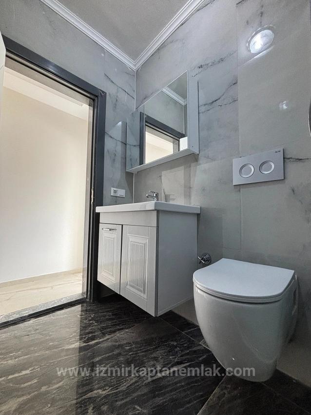 Seferihisar Doğanbey'de Deniz Manzaralı Kat Mülkiyetli 4+1 Satılık Villa