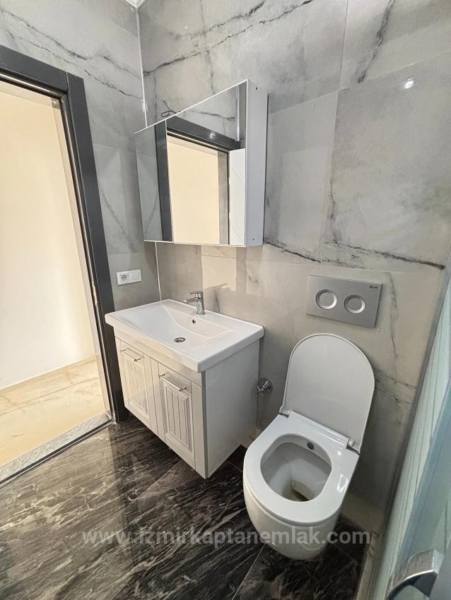 Seferihisar Doğanbey'de Deniz Manzaralı Kat Mülkiyetli 4+1 Satılık Villa