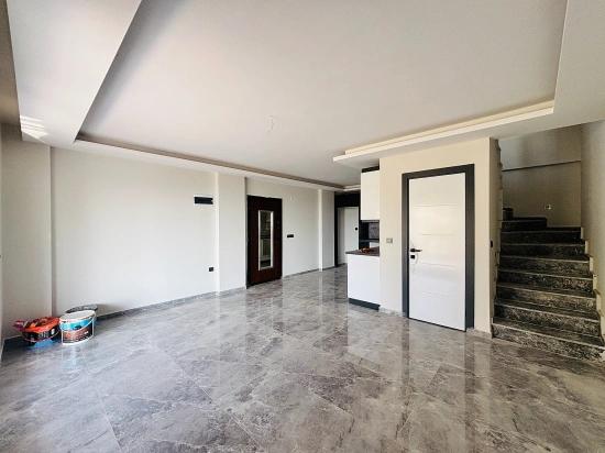 Doğanbey Atatürk Mahallesi Deniz Manzaralı Bahçeli Satılık 3+1 Villa