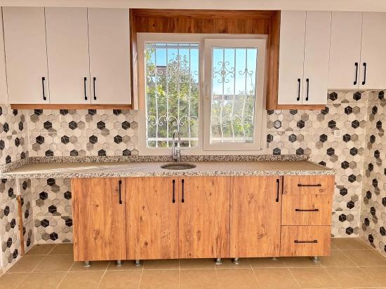 Seferihisar Ürkmez'de Ayrı Mutfak Bahçeli Masrafsız 2+1 Satılık Daire