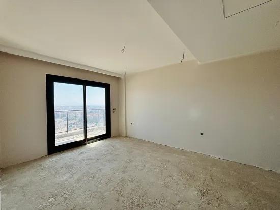 İzmir Seferihisar Deniz Manzaralı Havuzlu Site İçerisinde Satılık Dubleks Tripleks Villa